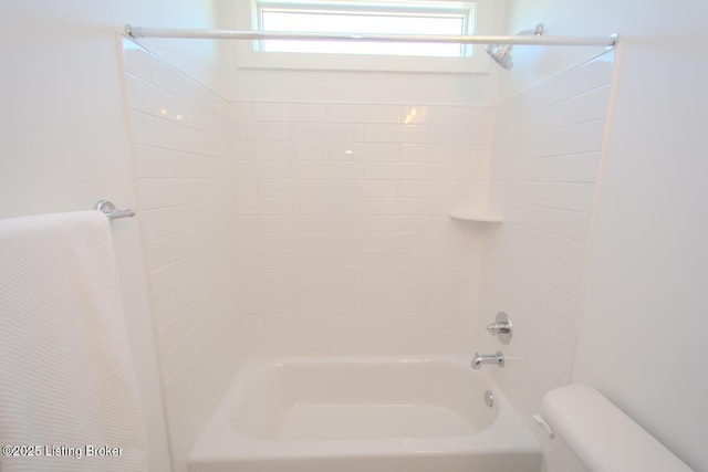 bathroom featuring a wealth of natural light, toilet, and shower / bath combination