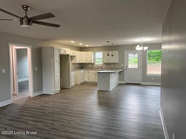5415 Mount Holyoke Dr, Louisville, KY 40216 - kitchen featuring baseboards, dark wood-style floors, a ceiling fan, a chandelier, and recessed lighting