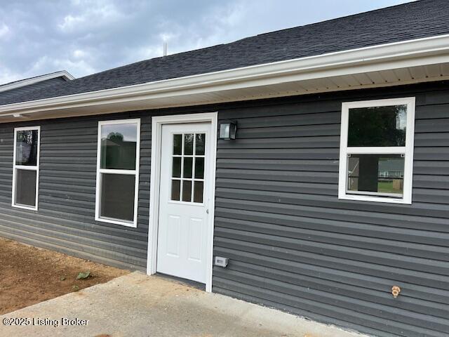 5415 Mount Holyoke Dr, Louisville, KY 40216 - doorway to property with roof with shingles