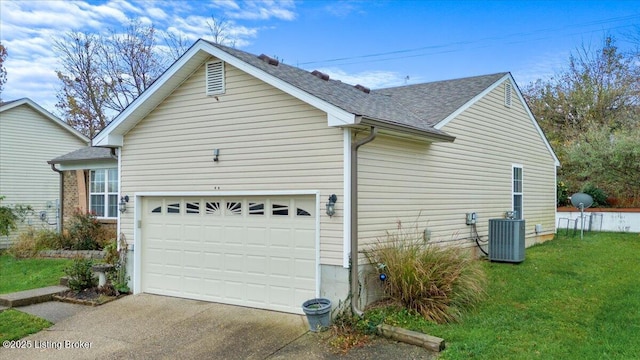 1312 Cedar Springs Pkwy, La Grange, KY 40031 - view of side of property with a garage, a lawn, concrete driveway, a shingled roof, and central AC unit