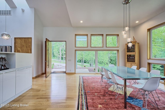 1301 S Buckeye Ln, Goshen, KY 40026 - dining space featuring light wood-style flooring, baseboards, recessed lighting, and vaulted ceiling