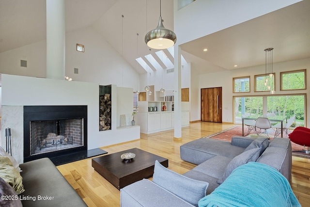 1301 S Buckeye Ln, Goshen, KY 40026 - living room with high vaulted ceiling, wood finished floors, and a fireplace