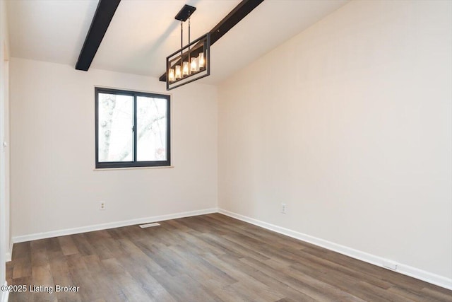 4804 Mike Ct, Louisville, KY 40291 - empty room featuring lofted ceiling with beams, dark wood-type flooring, visible vents, a chandelier, and baseboards
