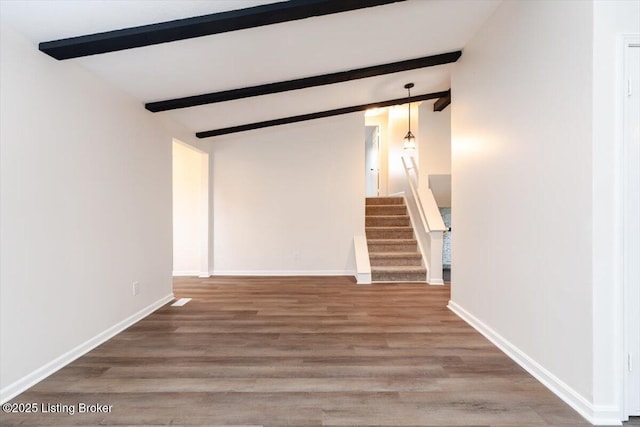 4804 Mike Ct, Louisville, KY 40291 - interior space featuring stairway, wood finished floors, baseboards, and vaulted ceiling with beams