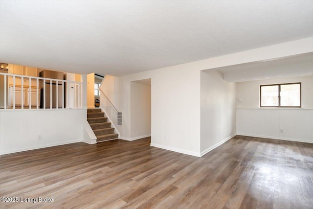 4804 Mike Ct, Louisville, KY 40291 - interior space featuring baseboards, stairway, and wood finished floors
