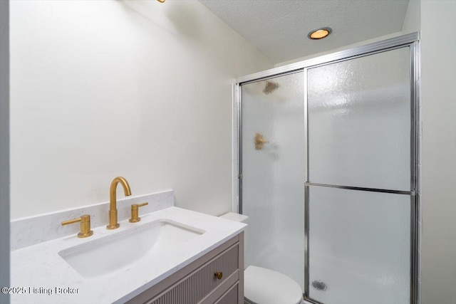 4804 Mike Ct, Louisville, KY 40291 - full bathroom with a shower stall, vanity, toilet, and a textured ceiling