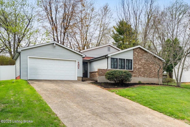 4804 Mike Ct, Louisville, KY 40291 - single story home featuring concrete driveway, an attached garage, a front lawn, and brick siding