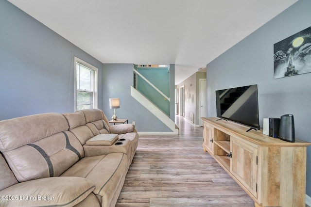 7110 Textile Ave, Louisville, KY 40258 - living area with stairs, light wood-style floors, and baseboards