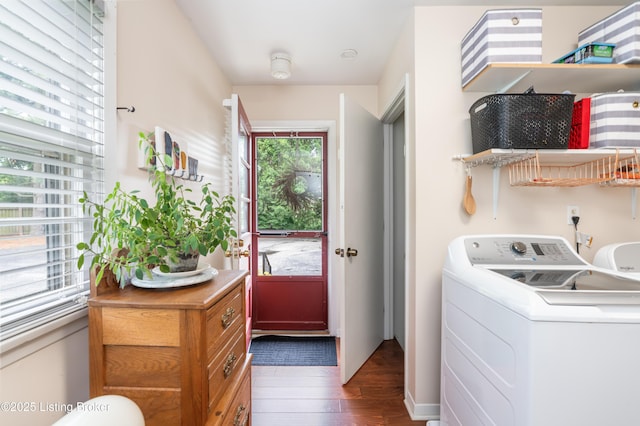 laundry room with washer / dryer, healthy amount of natural light, and wood finished floors