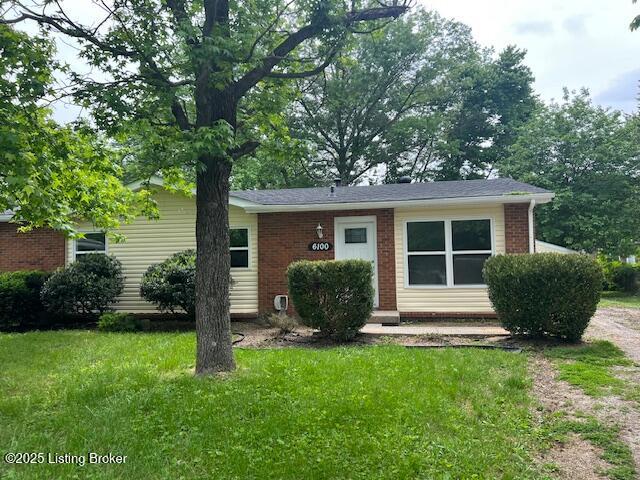 6100 Deady Dr, Louisville, KY 40258 - view of front facade featuring brick siding and a front yard