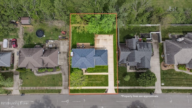 aerial perspective of suburban area with property parcel outlined