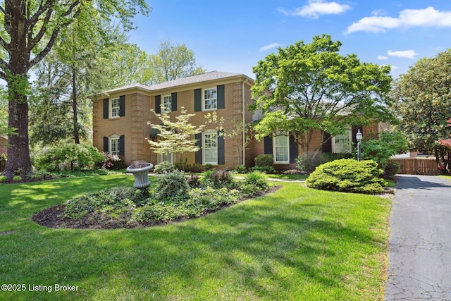 view of front of home with brick siding