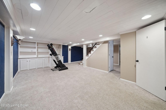 exercise area with carpet floors, recessed lighting, baseboards, and wood ceiling