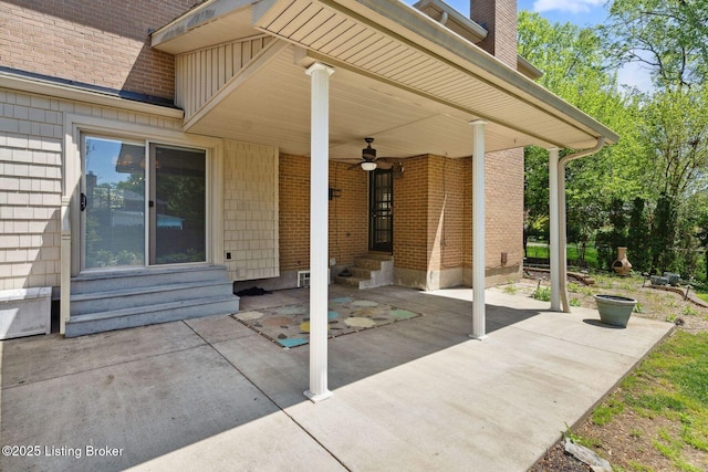 view of patio featuring entry steps and ceiling fan