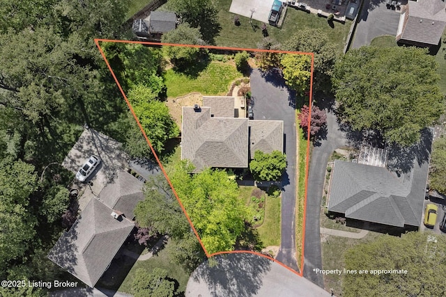 aerial perspective of suburban area with property parcel outlined