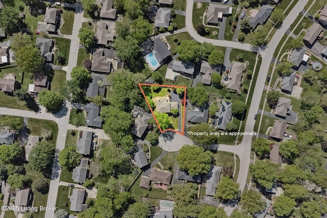aerial perspective of suburban area featuring property parcel outlined