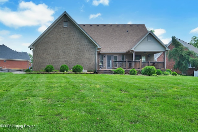 7728 Cottage Cove Way, Louisville, KY 40214 - back of property featuring brick siding, a ceiling fan, and a lawn