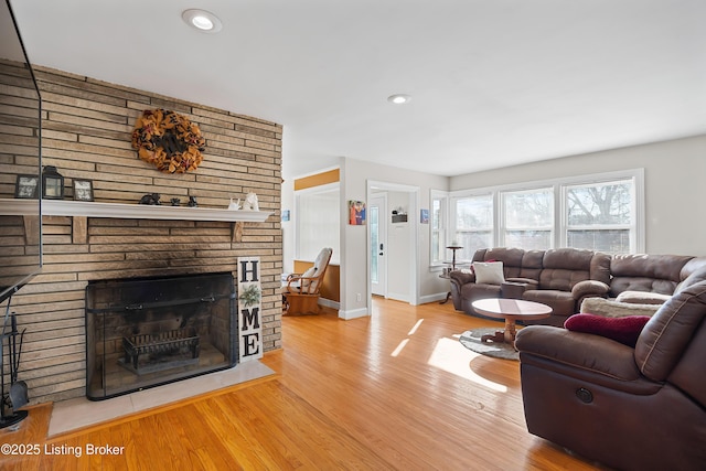 17 Denham Rd, Louisville, KY 40205 - living room with wood finished floors, a brick fireplace, baseboards, and recessed lighting