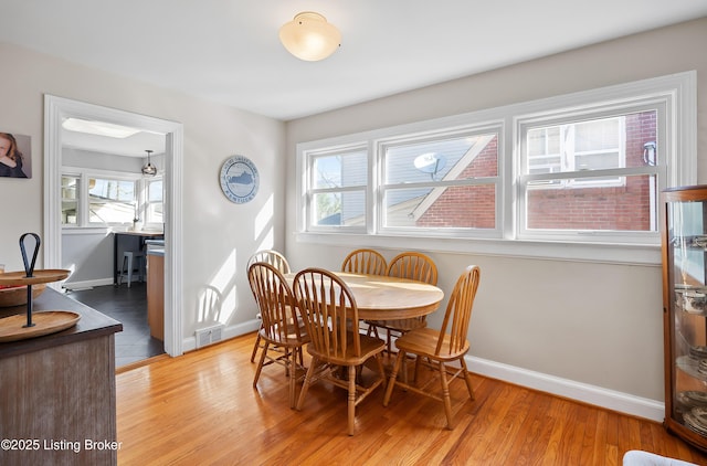 17 Denham Rd, Louisville, KY 40205 - dining room featuring plenty of natural light, light wood-style flooring, and baseboards