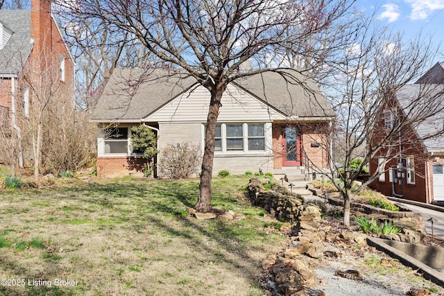17 Denham Rd, Louisville, KY 40205 - view of front of home featuring brick siding and a front yard