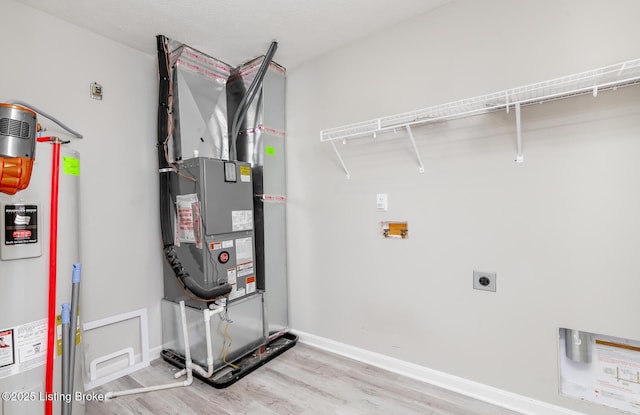 4612 Clayton Ter, Louisville, KY 40214 - utility room featuring water heater and heating unit