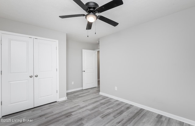 4612 Clayton Ter, Louisville, KY 40214 - unfurnished bedroom with wood finished floors, baseboards, a closet, and a ceiling fan