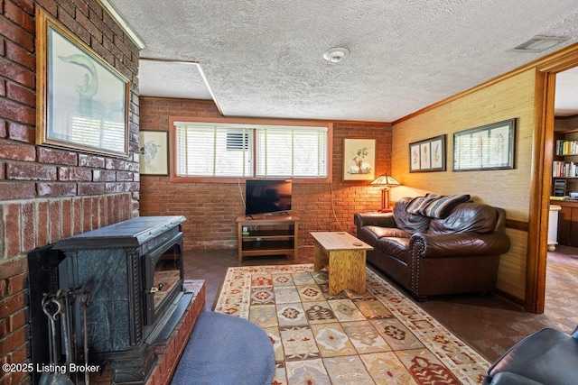 12715 Westport Rd, Louisville, KY 40245 - living area featuring a wood stove, brick wall, and a textured ceiling