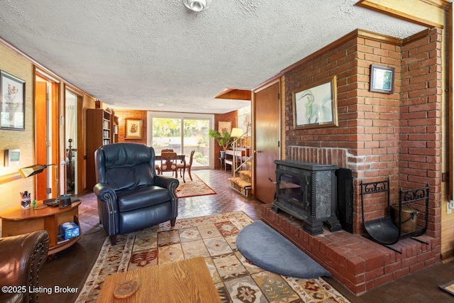 12715 Westport Rd, Louisville, KY 40245 - living room featuring a textured ceiling and a wood stove