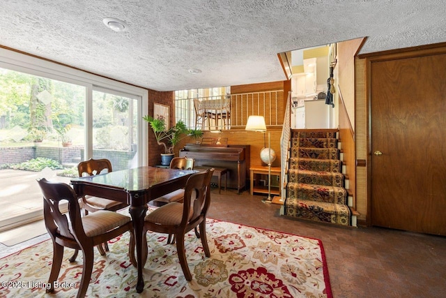 12715 Westport Rd, Louisville, KY 40245 - dining area featuring a textured ceiling and stairway