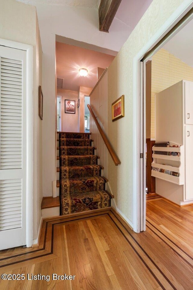 12715 Westport Rd, Louisville, KY 40245 - stairs with wood finished floors and baseboards