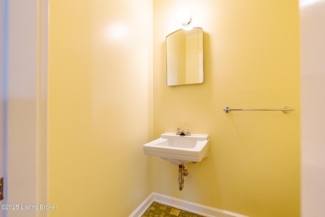 4305 Darbrook Rd, Louisville, KY 40207 - bathroom featuring baseboards and a sink