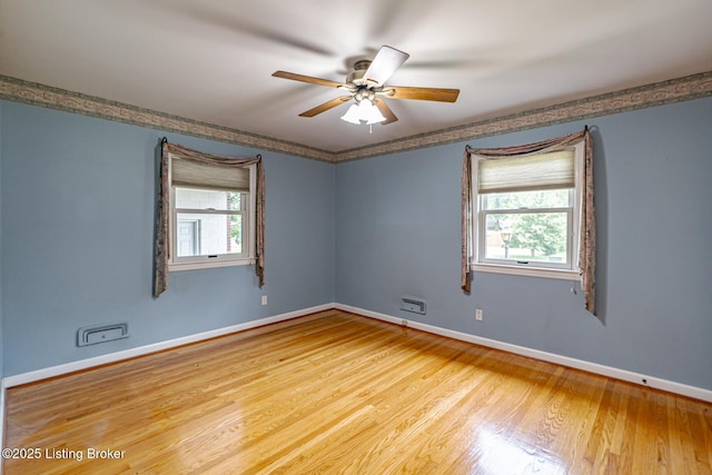 4305 Darbrook Rd, Louisville, KY 40207 - spare room featuring light wood-style flooring, healthy amount of natural light, and ceiling fan
