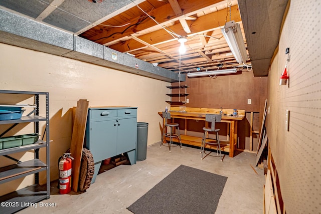 4305 Darbrook Rd, Louisville, KY 40207 - unfinished basement with a workshop area