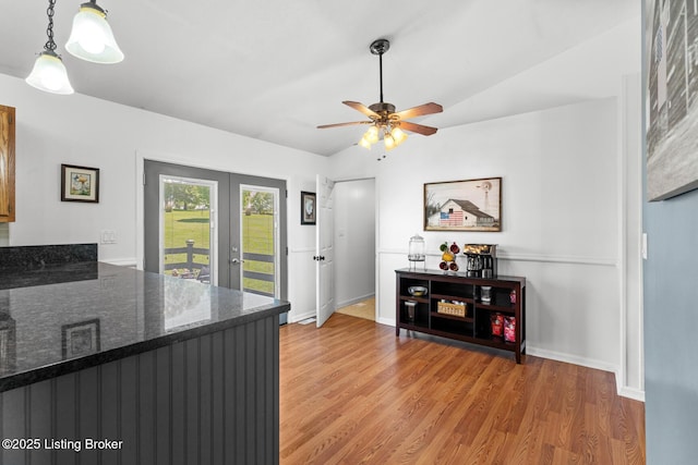 462 Wilsonville Rd, Fisherville, KY 40023 - dining space with french doors, light wood-type flooring, ceiling fan, vaulted ceiling, and baseboards
