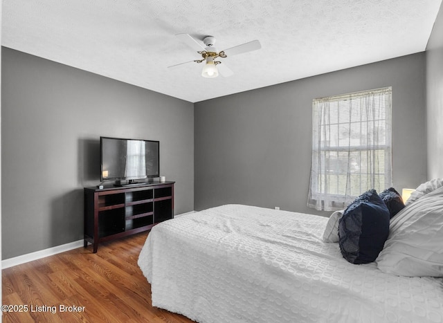 462 Wilsonville Rd, Fisherville, KY 40023 - bedroom featuring wood finished floors, baseboards, ceiling fan, and a textured ceiling