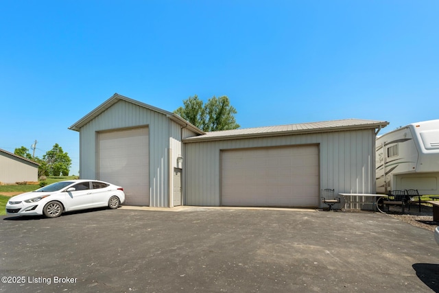 462 Wilsonville Rd, Fisherville, KY 40023 - view of front facade featuring an outdoor structure, metal roof, and a detached garage