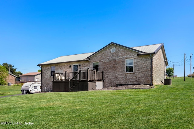 462 Wilsonville Rd, Fisherville, KY 40023 - rear view of house with brick siding, a deck, a lawn, stairway, and metal roof