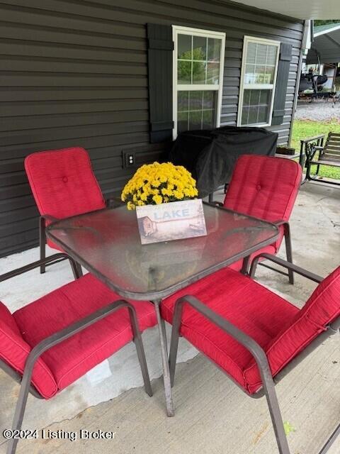 116 Spring Meadow Cir, Campbellsville, KY 42718 - view of patio / terrace featuring outdoor dining space and a porch