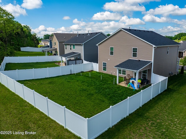 11905 Parkside Vista Ln, Louisville, KY 40229 - back of house with a residential view and a patio