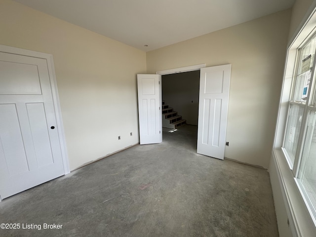 309 Ashwood Ave, Elizabethtown, KY 42701 - unfurnished bedroom featuring concrete floors