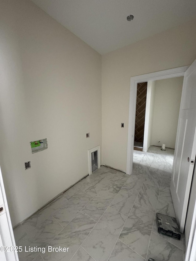 309 Ashwood Ave, Elizabethtown, KY 42701 - laundry area with light marble finish floors