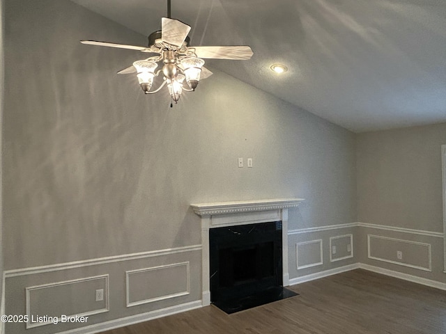 3809 Chamberlain Ln Unit D, Louisville, KY 40241 - unfurnished living room featuring a ceiling fan, dark wood-style flooring, lofted ceiling, and a fireplace with flush hearth
