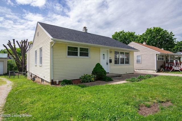 522 Lee Rd, Elizabethtown, KY 42701 - view of front of property with a front lawn, a chimney, and a shingled roof