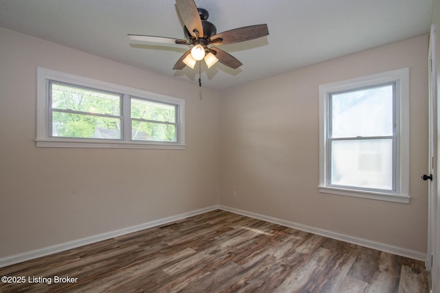 522 Lee Rd, Elizabethtown, KY 42701 - unfurnished room featuring wood finished floors, baseboards, and a ceiling fan