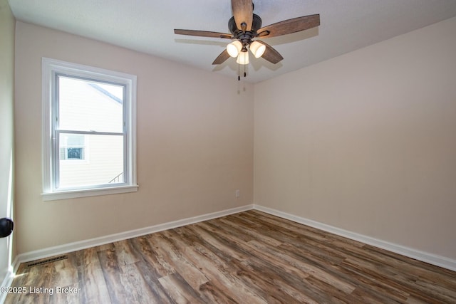 522 Lee Rd, Elizabethtown, KY 42701 - unfurnished room featuring wood finished floors, baseboards, and ceiling fan