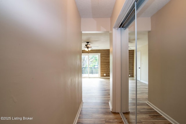 522 Lee Rd, Elizabethtown, KY 42701 - hallway with dark wood-type flooring, baseboards, and a textured ceiling