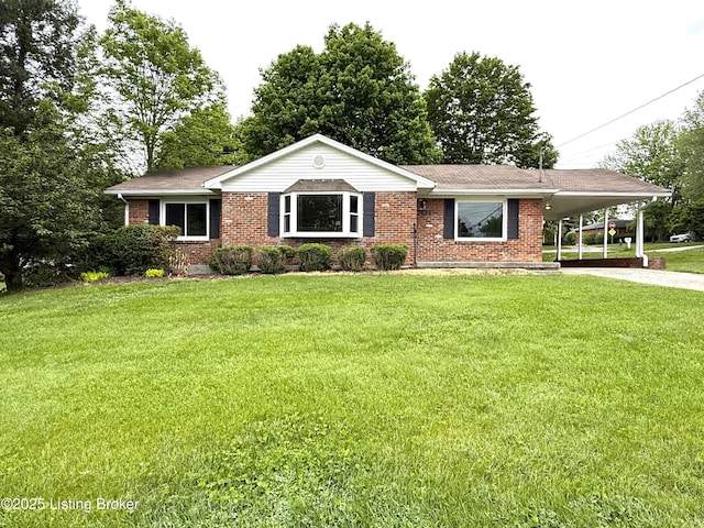 701 Dogwood Dr, Elizabethtown, KY 42701 - ranch-style house with brick siding, driveway, a carport, and a front yard