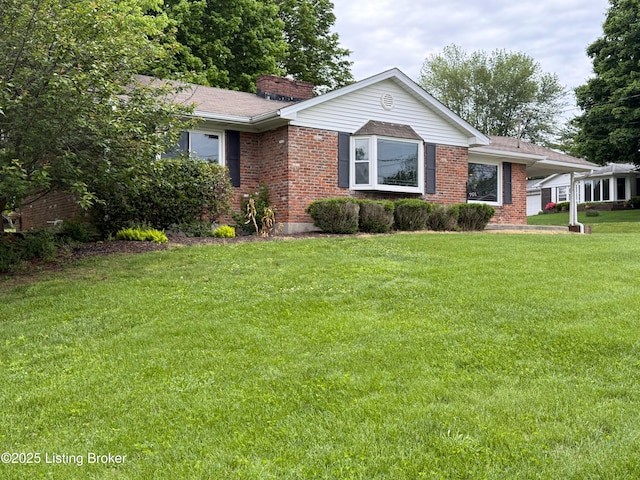 701 Dogwood Dr, Elizabethtown, KY 42701 - ranch-style house featuring brick siding and a front yard