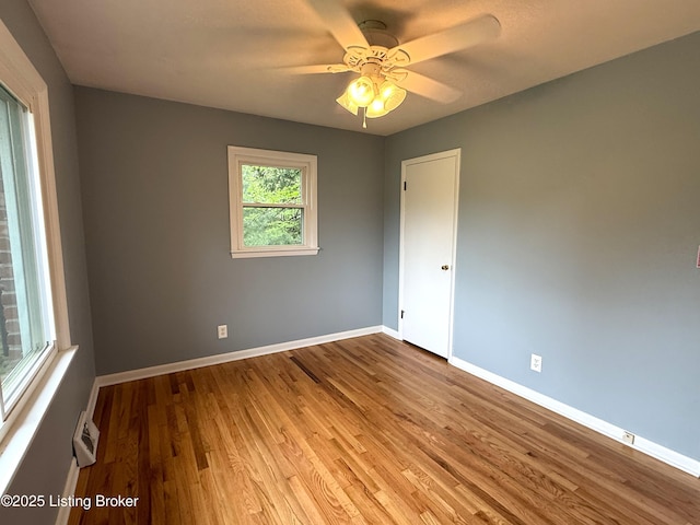 701 Dogwood Dr, Elizabethtown, KY 42701 - empty room featuring wood finished floors, baseboards, and ceiling fan