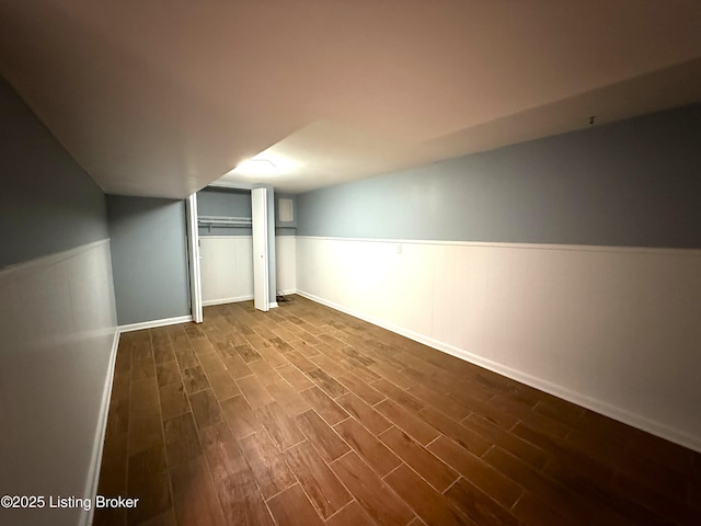 701 Dogwood Dr, Elizabethtown, KY 42701 - finished below grade area featuring dark wood-style floors, wainscoting, and baseboards